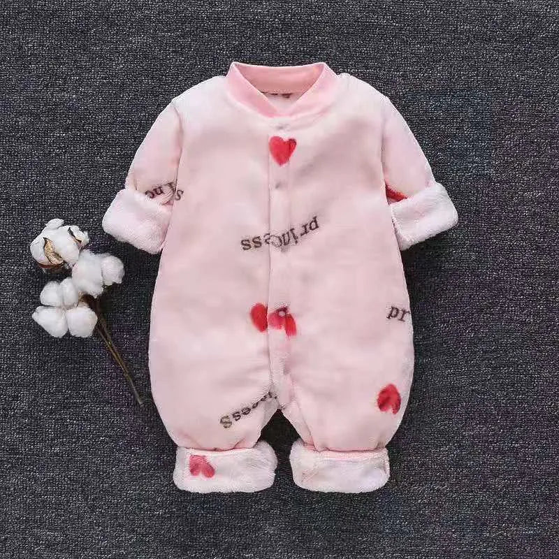Baby wearing a long sleeve flannel romper with a panda print design