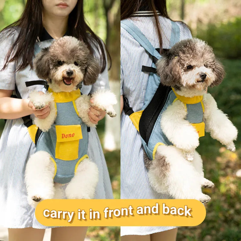 A person wearing a blue and yellow front-carry pet sling backpack containing a small dog, with adjustable cross-shoulder straps.