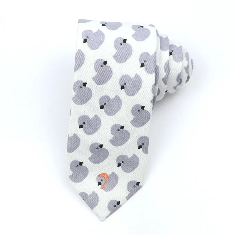 Narrow Korean style cotton bow tie with a printed cartoon pattern in various colours.