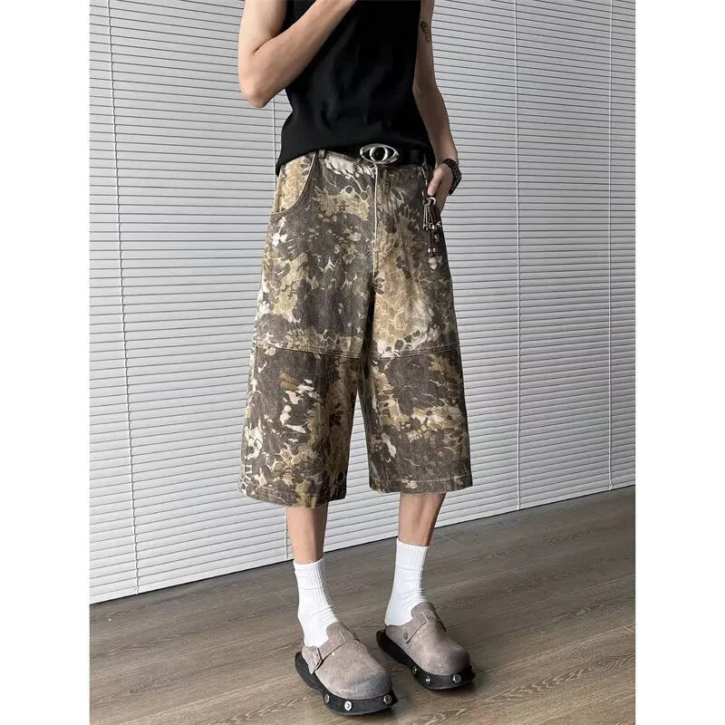 Yellow snake pattern camouflage cropped jeans in cotton denim.