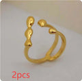 Brass women's fashion ring with spherical design in gold or silver colour