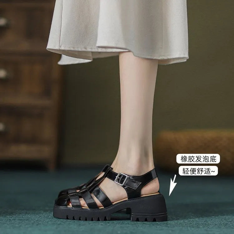 Women's beige retro platform sandals with chunky rubber sole and buckle closure.