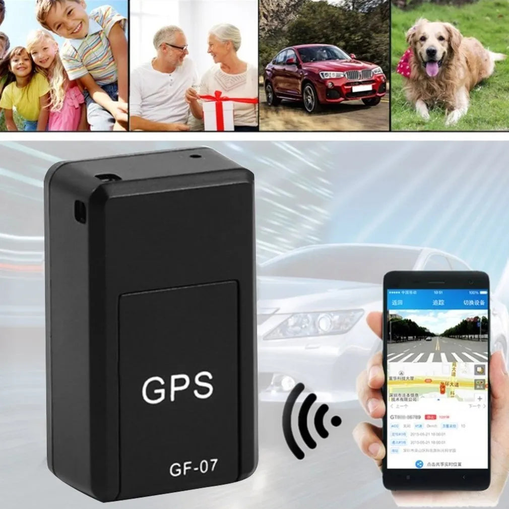 Small black plastic magnetic GPS tracker device next to a USB charging cable.