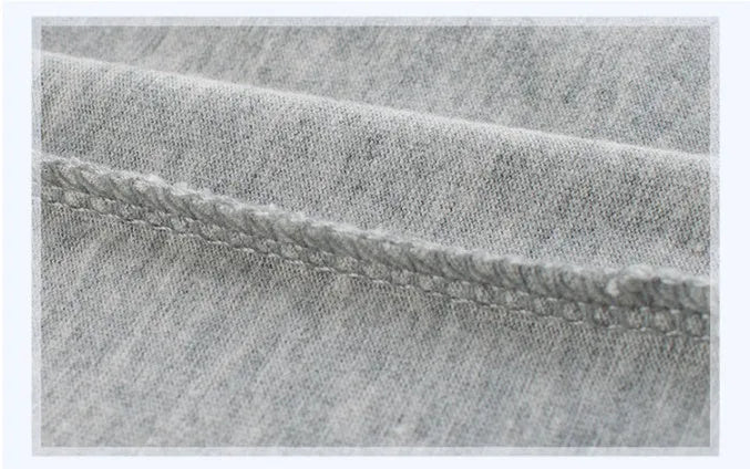 Grey children's cotton T-shirt with a printed graphic design on the front.