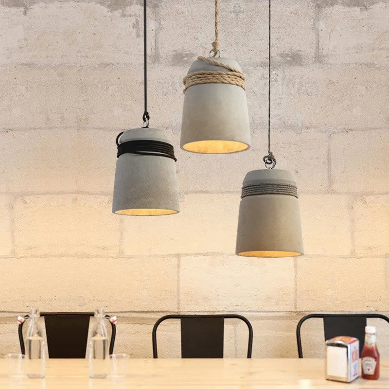 Retro industrial cement pendant lamp with antique shade and choice of black line, floral thread or hemp rope suspension.