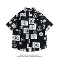Loose fit short sleeve cardigan shirt with a colourful floral print pattern.