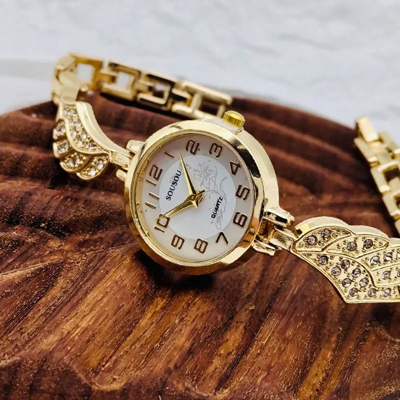 Ladies stainless steel watch with round dial and 9mm thickness in gold, black gold, or white gold
