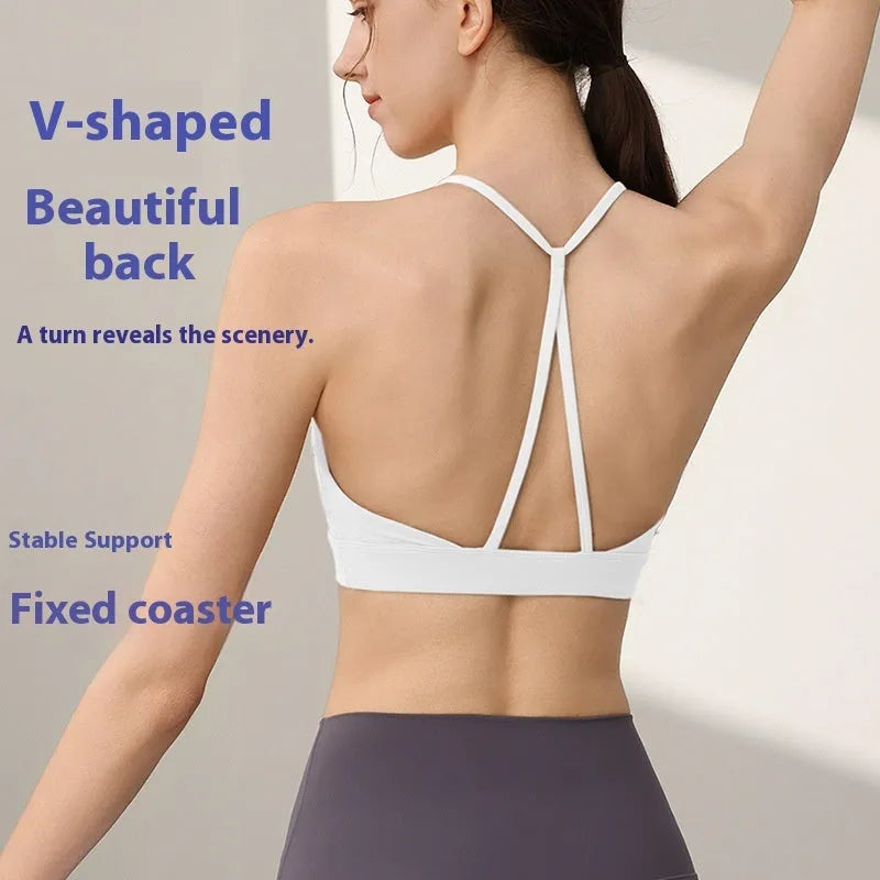 Women's nylon sports vest with fixed double-shoulder straps on a hanger