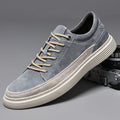 Men's grey casual leather skate shoes with round toe and lace-up front