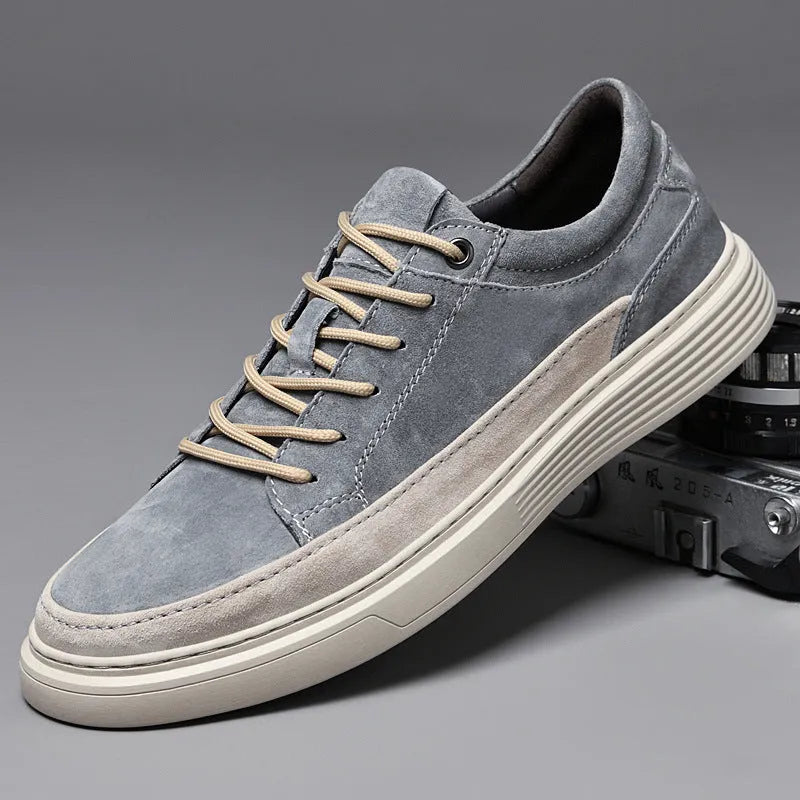 Men's grey casual leather skate shoes with round toe and lace-up front