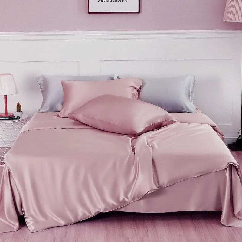 Solid colour silk duvet cover laid flat, showing plain weave texture in a choice of six colours.