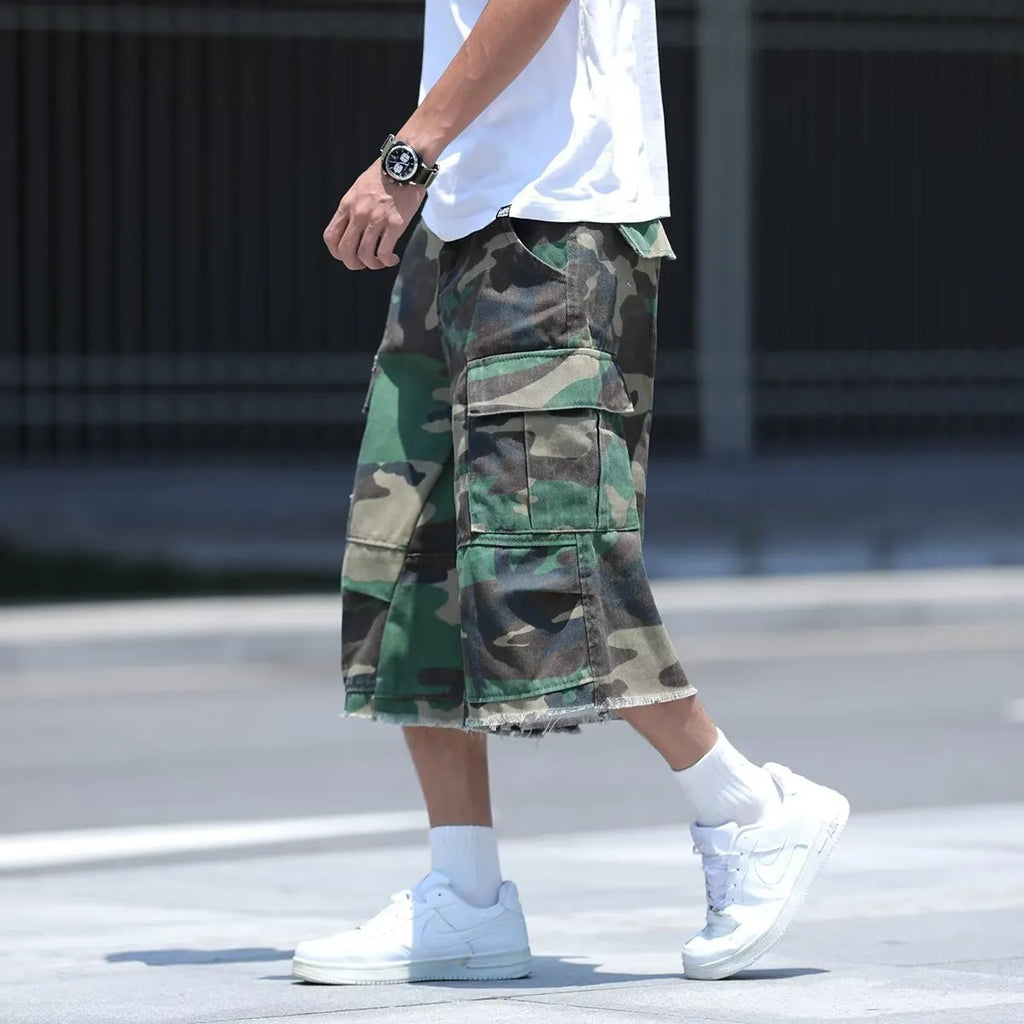 American retro workwear camouflage shorts with polyurethane trim in loose-fit cropped design