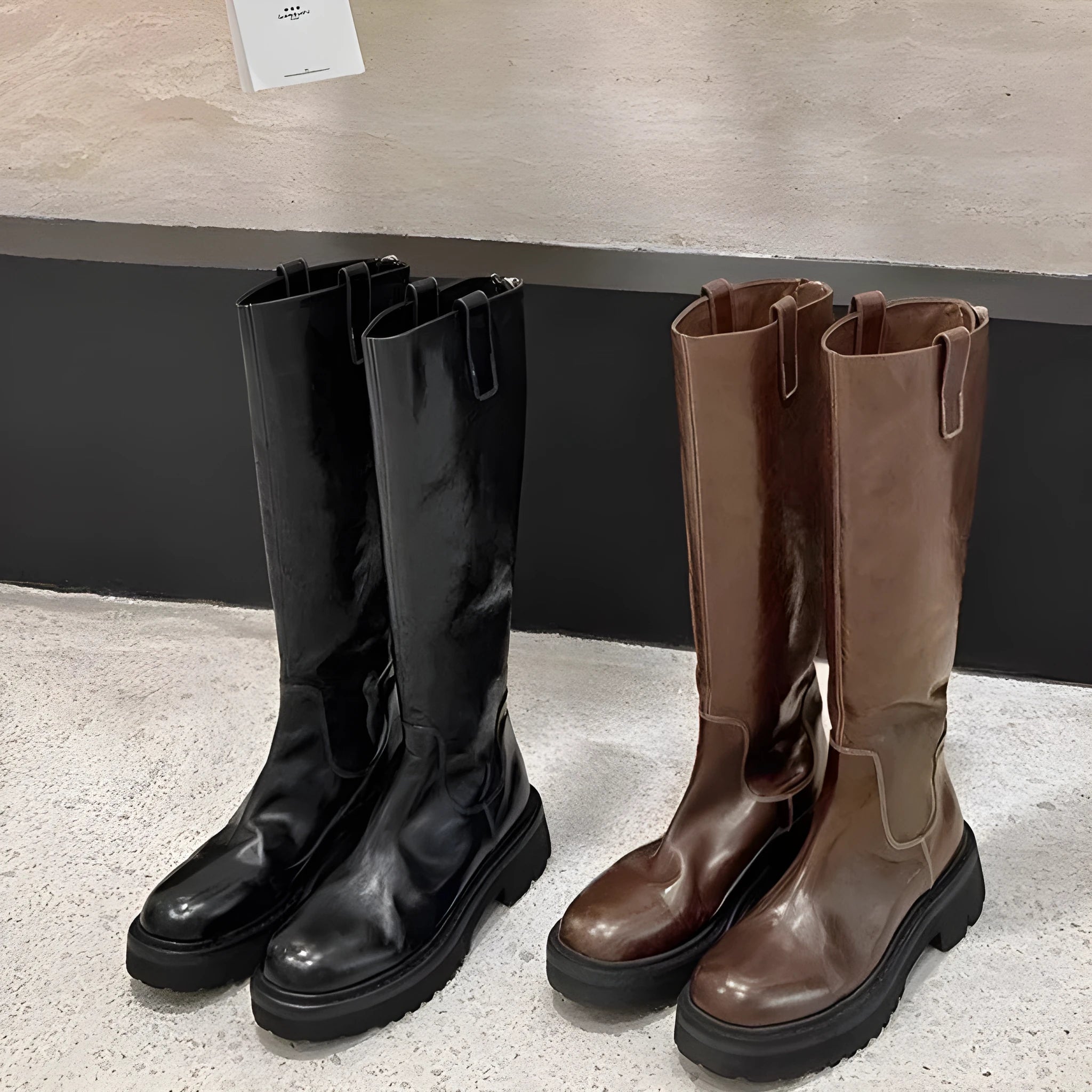 Black round toe chunky heel knee high boots with back zipper fastening