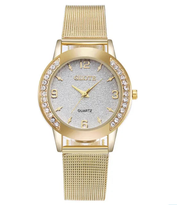 Golden mesh strap alloy electronic watch with round dial and world time GMT functions on a plain background