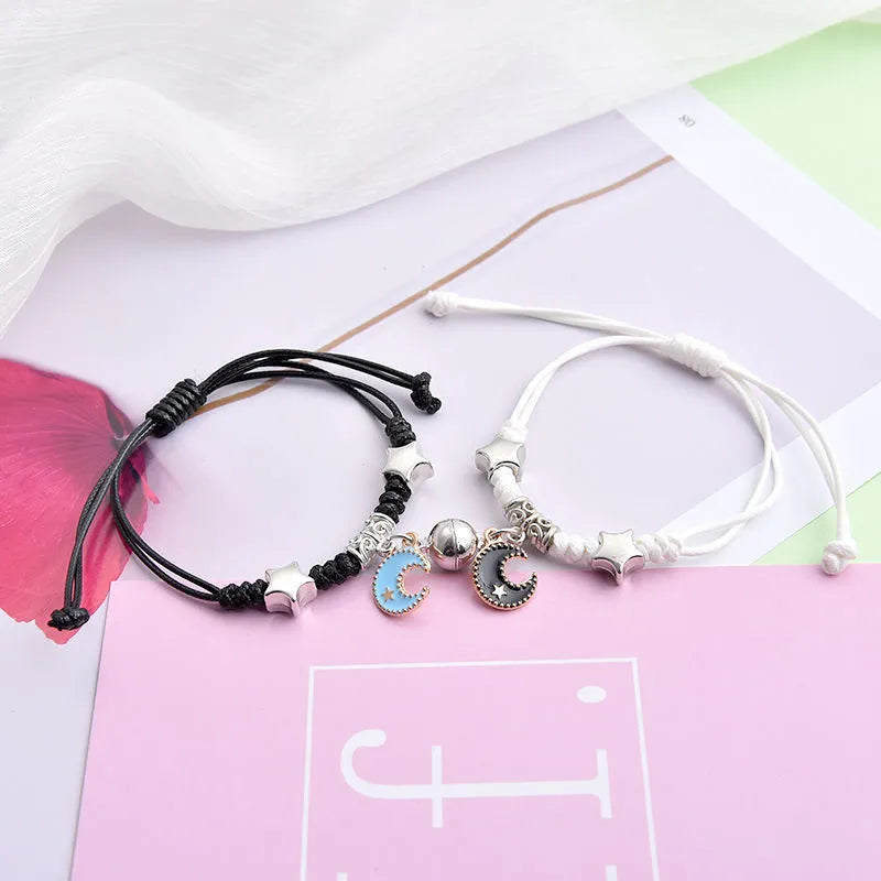 Magnet couple bracelets with electroplated finish showing magnetic clasp and symbolic design options