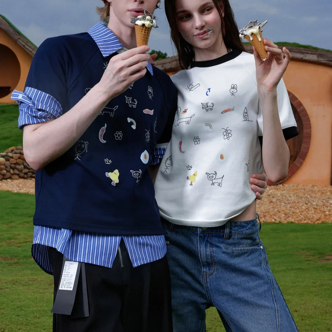 Men's blue cartoon printed short sleeve shirt with contrasting panels and loose fit design