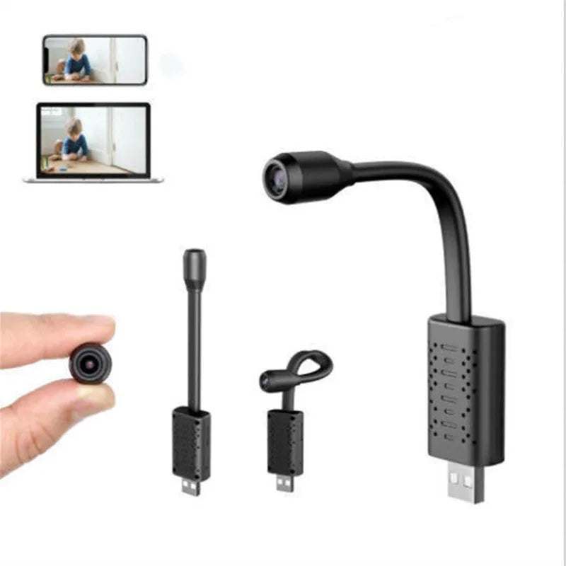 Black V380 wireless USB camera showing compact size and USB port.