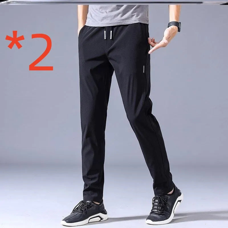 Men's drawstring trousers Korean version loose straight leg sweatpants in khaki colour on model
