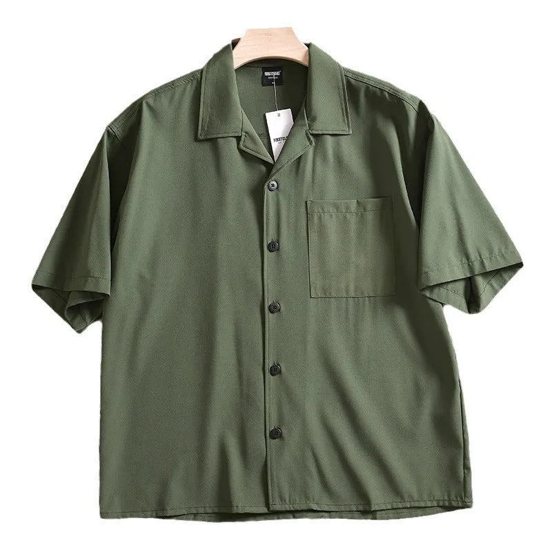 Men's lightweight loose short sleeve solid colour summer shirt in Army Green on model