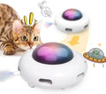White UFO-shaped automatic cat toy with feathers, LED lights, and a detachable hair-cleaning ring.
