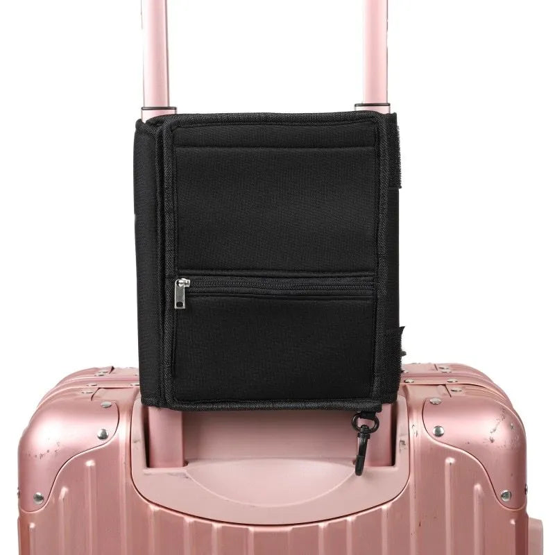 Black canvas folding travel tote bag with shoulder strap for packing and shopping