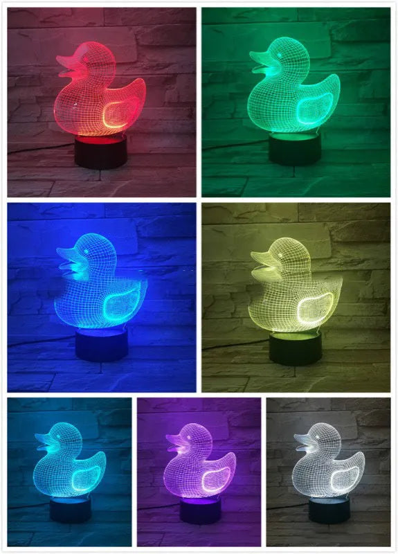 Little yellow duck 3D acrylic night light with colour-changing LED and remote control on table
