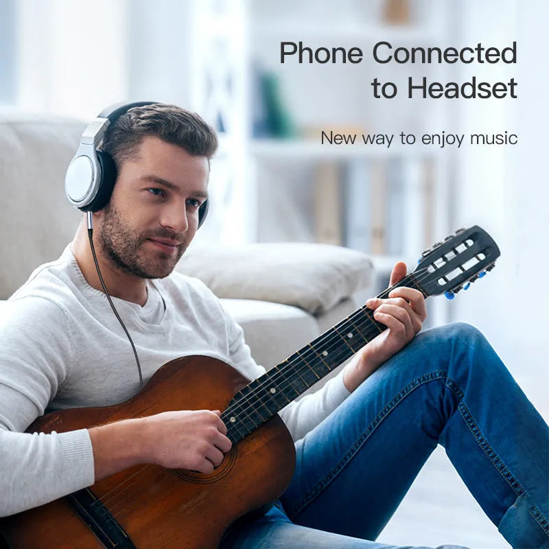 Nylon-braided 3.5mm audio cable with silver connectors in black and silver colour options.
