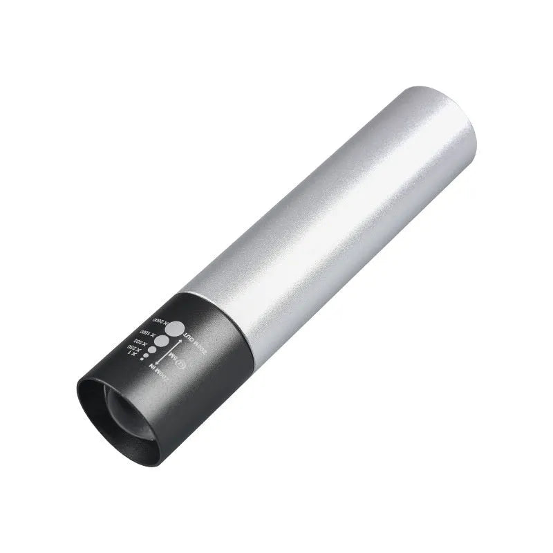 Handheld black aluminium red light mosquito repellent lamp with USB charging cable.