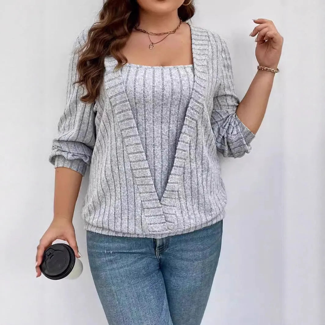 Women's solid colour rib fabric false two-piece suit with V-neck and long sleeves.