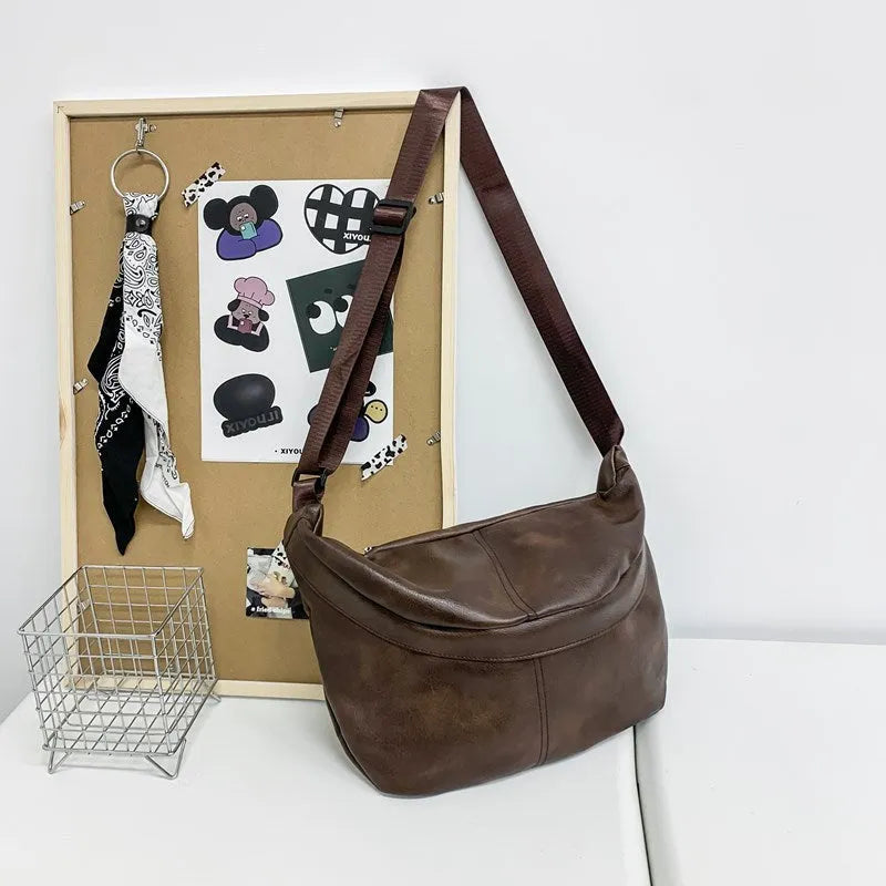 Men's brown retro crossbody bag showing 50cm width and PU leather construction
