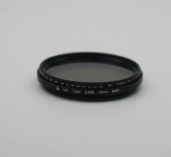 Adjustable camera ND filter with multiple thread diameters for light reduction and exposure control