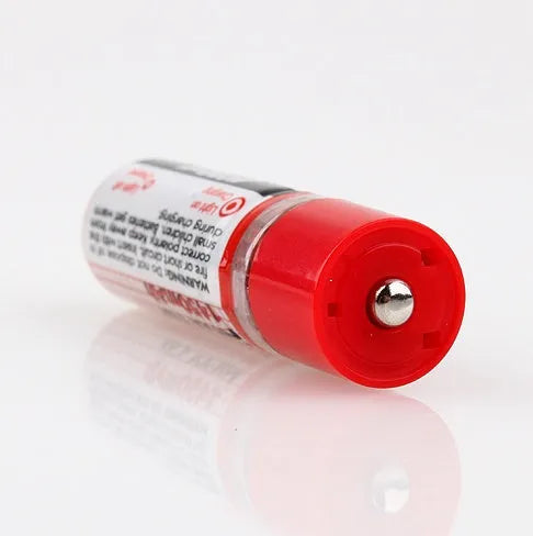 Two red USB rechargeable AA Ni-MH batteries with blue LED charging indicator on white background