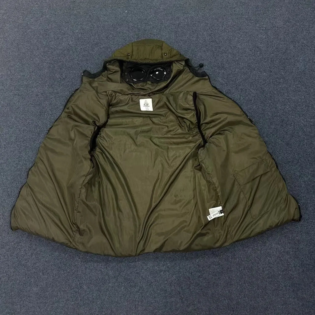 Men's loose hooded cotton vest jacket in black, side view, showing hood and zip closure