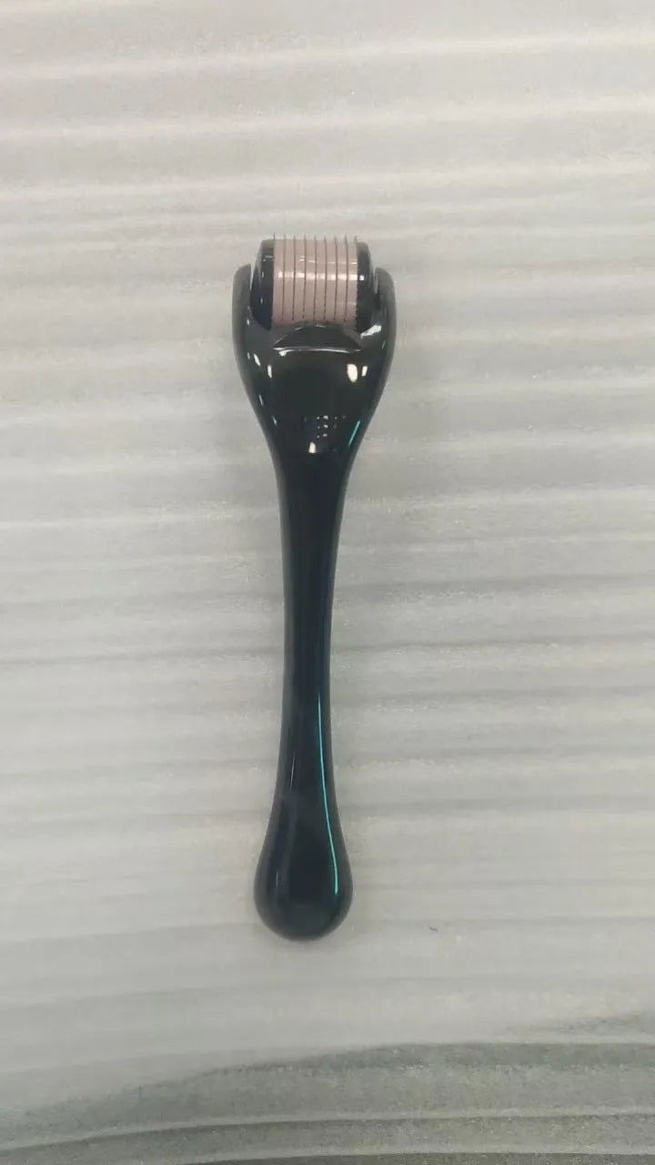 540 micro needle derma roller with black handle and purple wheel, showing adjustable needle sizes.
