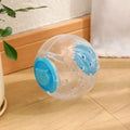 Clear blue ABS plastic slow feeder ball for cats, 11.5cm in diameter, on a wooden floor.