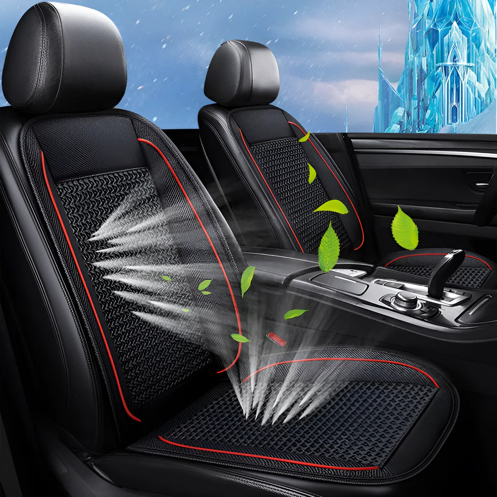 Black car ventilation seat cushion with power cord, shown on a car seat