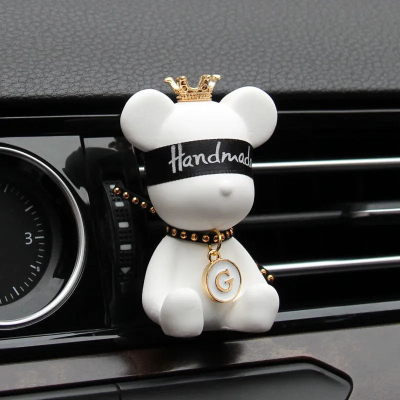 Black rivet bear shaped gypsum car perfume accessory clipped onto vehicle air outlet