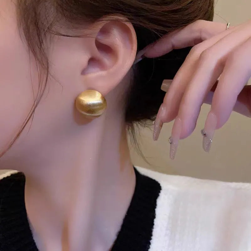 Matte brushed gold bean earrings for women, hypoallergenic studs with post-back closure, gold colour option