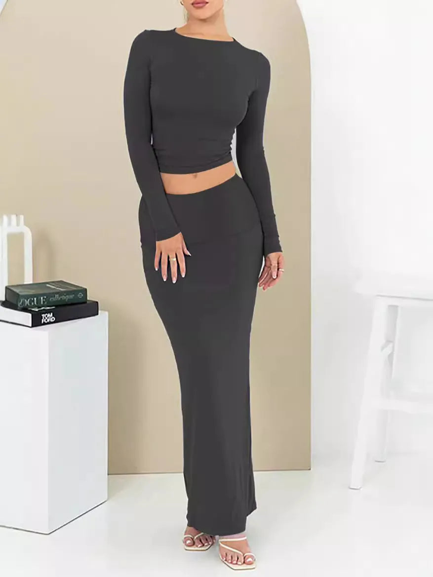 Women's black two-piece suit with three-quarter sleeves and long skirt in fresh sweet style