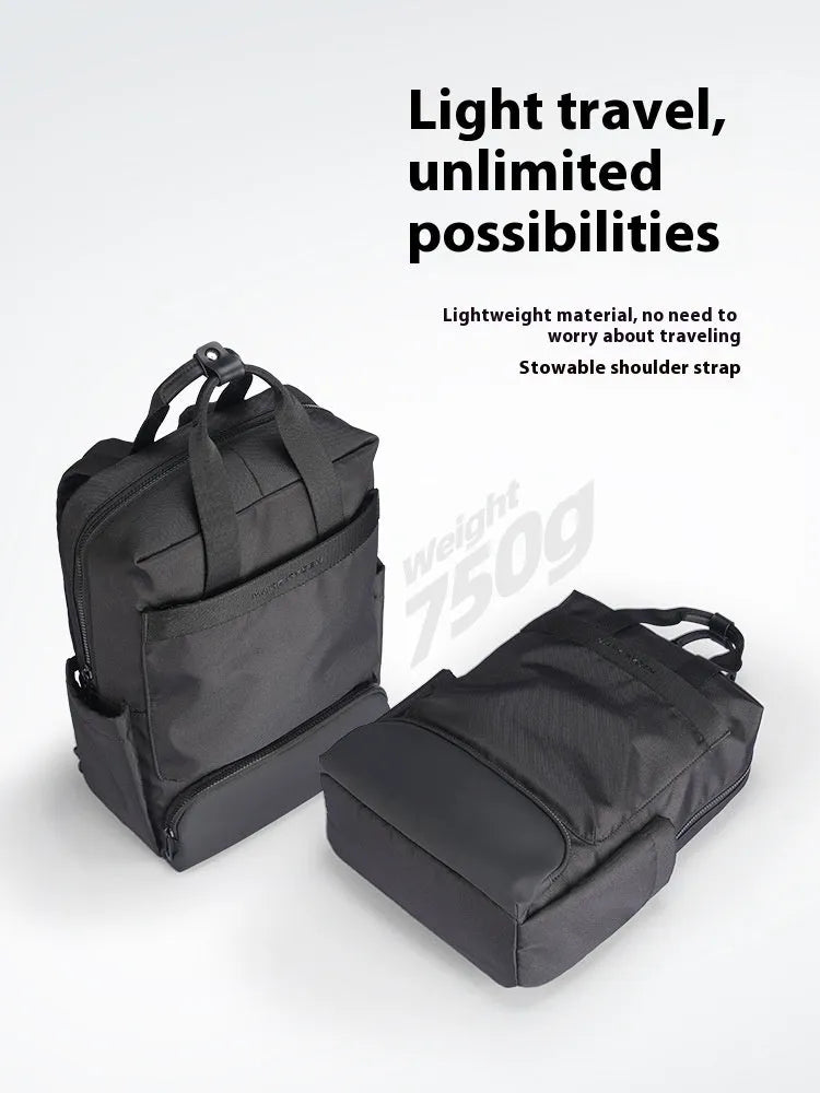 Elegant black Oxford cloth computer backpack with a capacity of 20-35 litres.