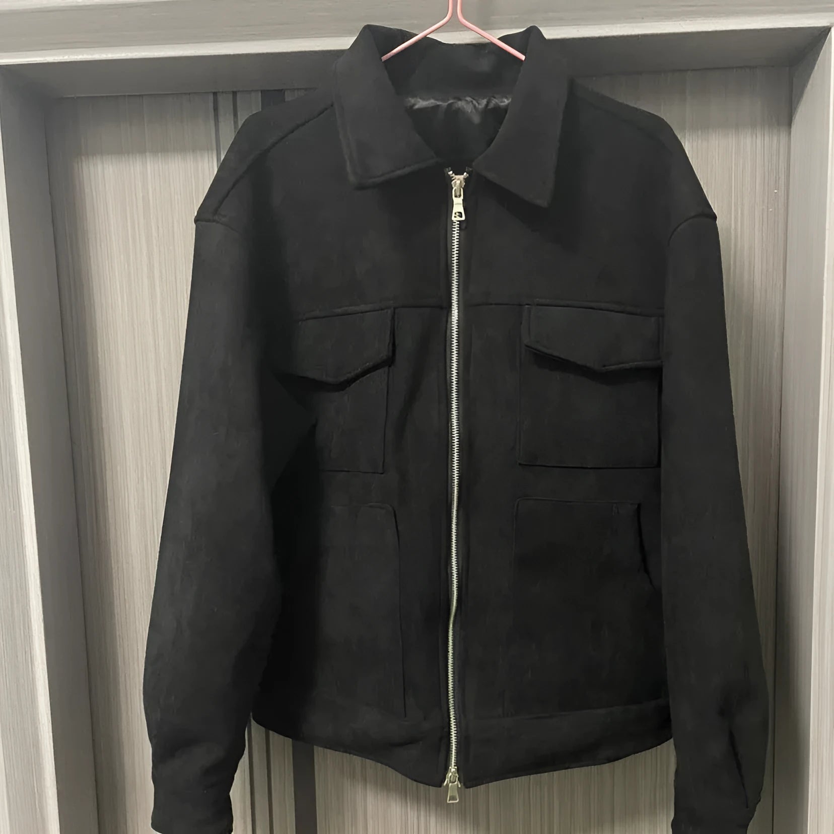 Thickened slim fit jacket coat with a large zippered pocket, shown in camel colour