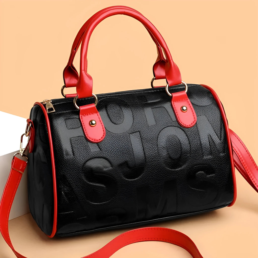 Brown cylindrical PU crossbody bag with a leather-like texture and three shoulder straps.