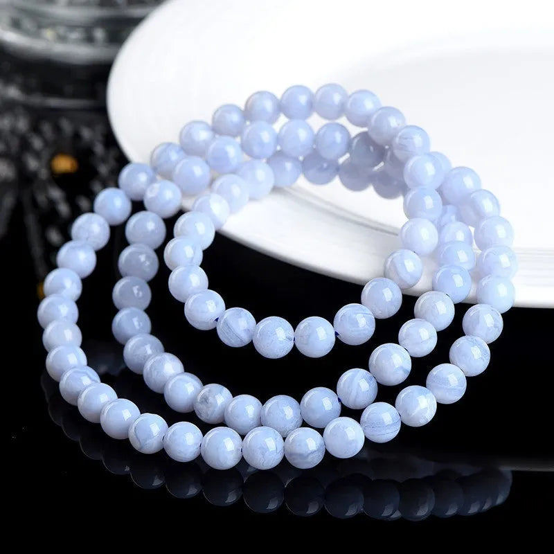 Blue striped agate bracelet with three circles of 6-6.8mm beads in unisex design