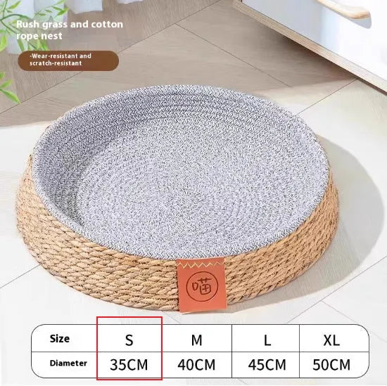 Natural rattan cat bed nest shown in a small size, suitable for a domestic cat.