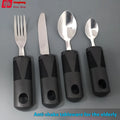 Stainless steel adaptive cutlery set with rubber handles for elderly or disabled users