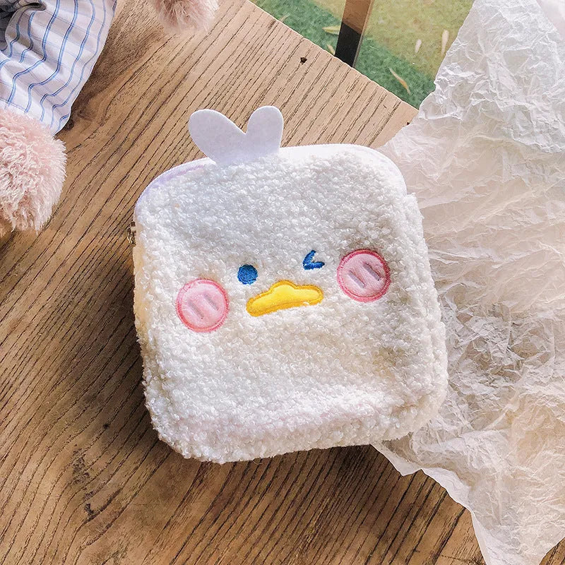 Flannel sanitary napkin storage bag in pink with large capacity, compact 13cm size