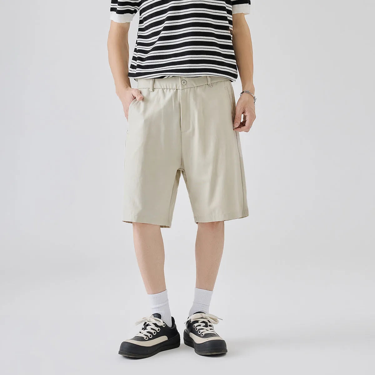 Men's lyocell casual shorts in apricot colour with loose fit design and elastic waistband