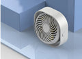 Compact USB desk fan in blue with 360-degree rotation head and rotary switch.