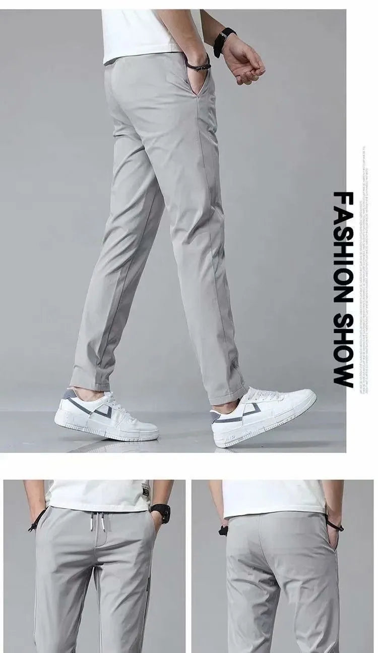 Men's drawstring trousers Korean version loose straight leg sweatpants in khaki colour on model