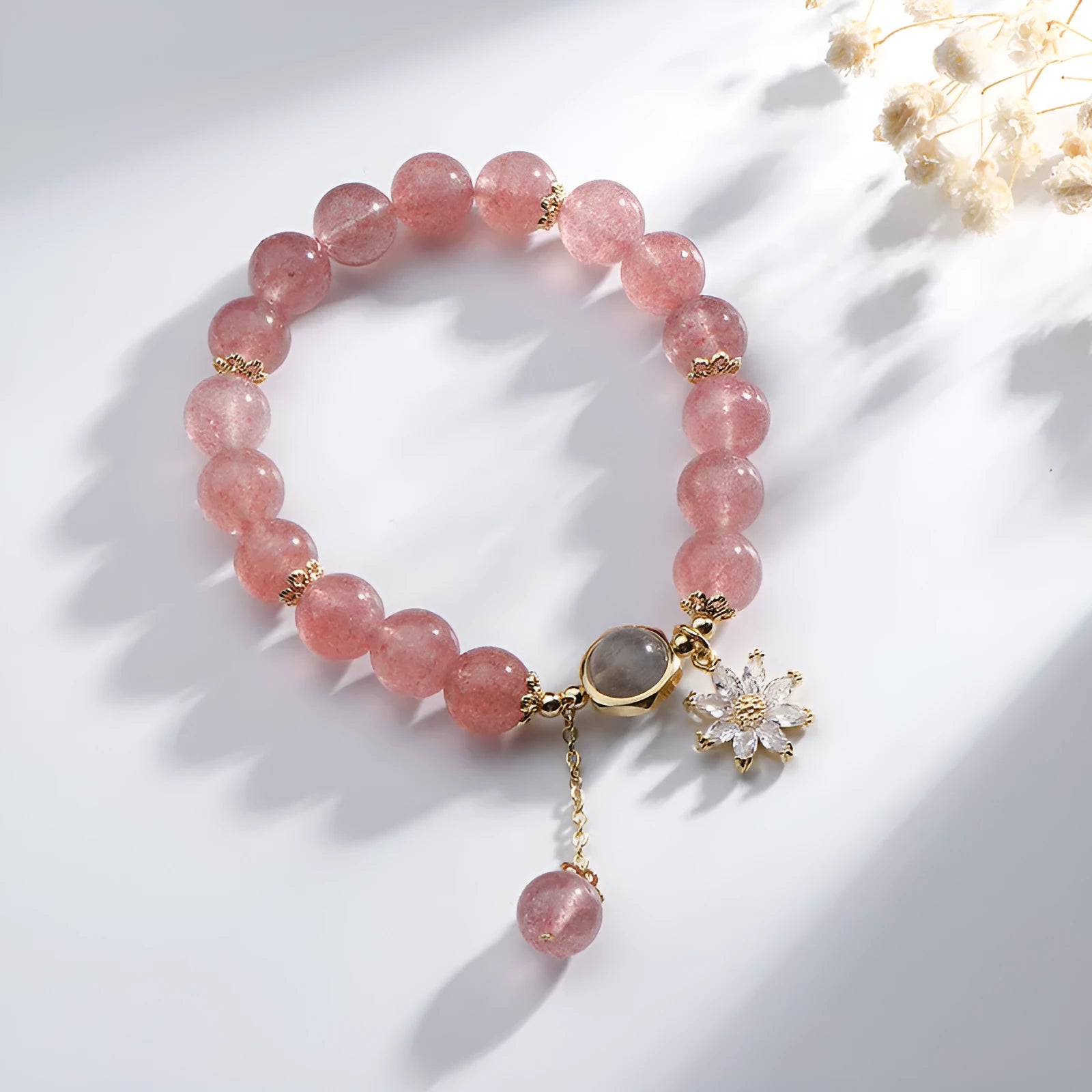 Strawberry quartz crystal bracelet with electroplated floral details in Mori Korean style.